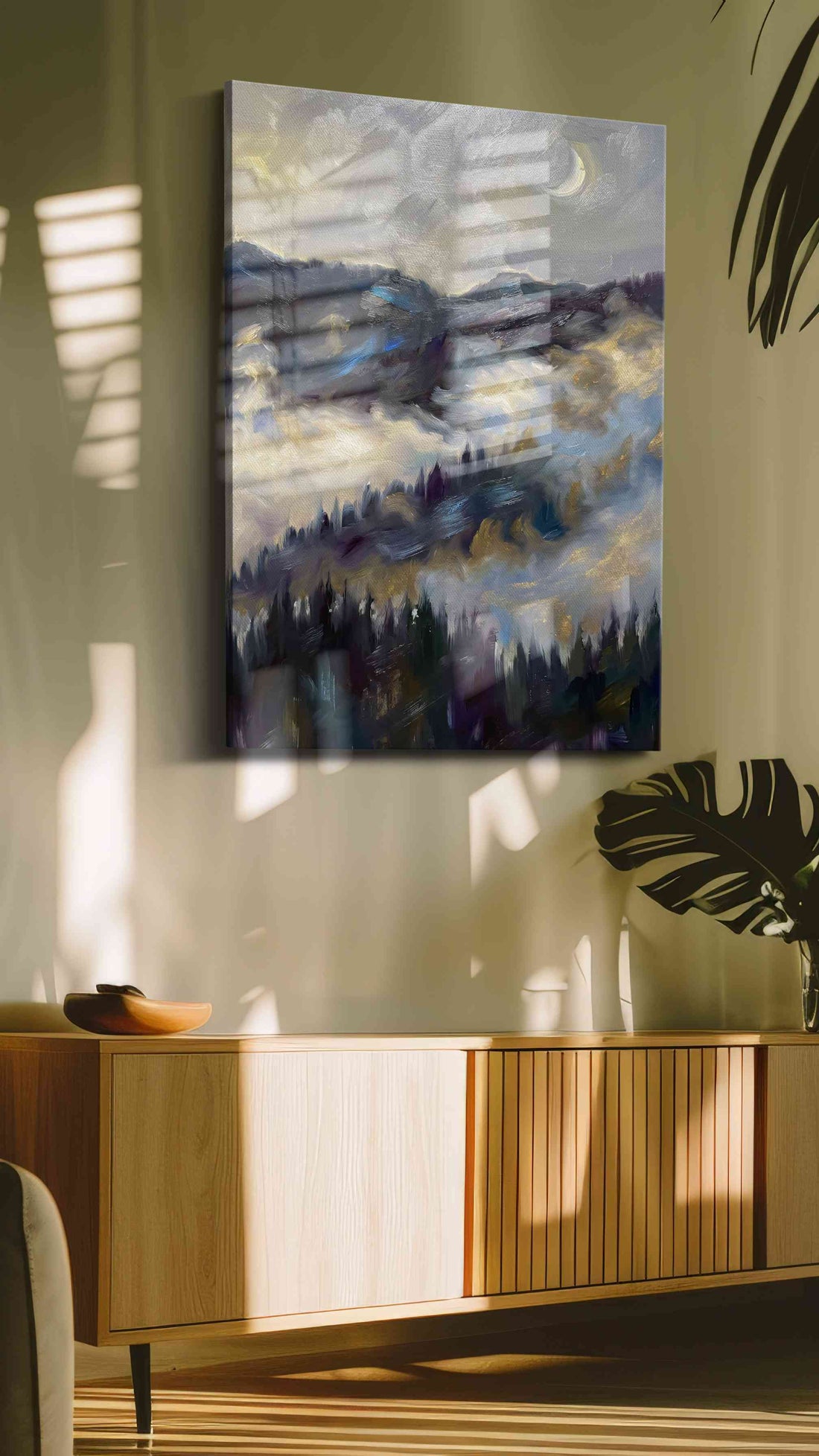 Misty mountain landscape canvas hung in a contemporary living room