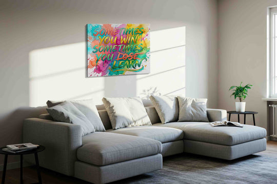 Motivational canvas wall art hung on an office wall