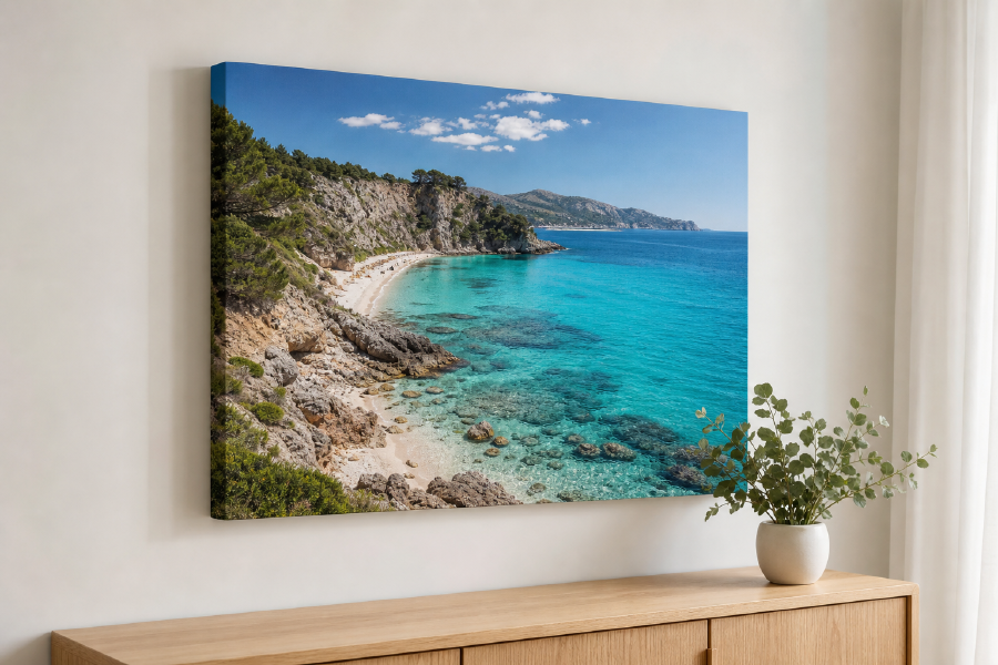 A travel photograph printed on gallery-wrapped canvas hanging above a wooden console