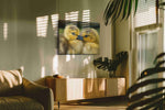 Whispers of Fuzzy Companions birds canvas print, hanging on wall — in a hung canvas mockup