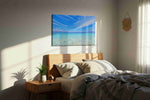 Azure Tranquility beach canvas print, displayed in a bedroom
