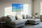 Azure Tranquility beach canvas print in a living room scene