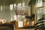 Golden Tides of Serenity beach canvas print in a hung canvas mockup