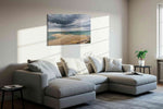 Storm Over Tranquil Shore beach canvas print in a living room scene