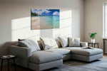 Whispers of the Azure Tides beach canvas print, displayed in a living room