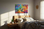 Rainbow Nectar Symphony birds canvas print, displayed in a bedroom