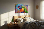 Rainbow Whispers birds canvas print, displayed in a bedroom