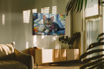 Colorful Whisker Symphony cats canvas print in a hung canvas mockup