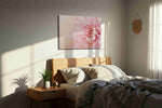 Blossom of Serenity floral canvas print, displayed in a bedroom