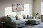 Whispers of Spring Blossoms floral canvas print, displayed in a living room