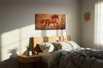 Flame-Hued Gallop horses canvas print, displayed in a bedroom