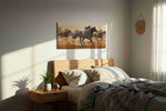 Gallop of Champions horses canvas print, displayed in a bedroom