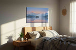Dreamscape Over Serene Waters landscape canvas print, displayed in a bedroom
