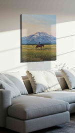 Riders at Dawn's Embrace landscape canvas print, displayed in a living room