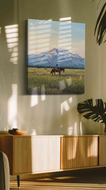 Riders at Dawn's Embrace landscape canvas print in a hung canvas mockup