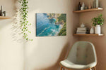 Waves Whisper to Cliffs landscape canvas print, displayed in a living room