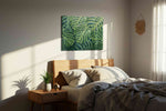 Monstera Dreamscape leaves canvas print, displayed in a bedroom