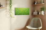 Emerald Canopy leaves canvas print, displayed in a living room