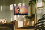 Sunset Serenity Dance beach canvas print in a contemporary interior mockup