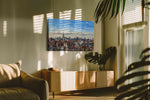 Cityscape Symphony in Blue urban canvas print in a hung canvas mockup