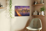 Twilight City Glow urban canvas print, displayed in a living room