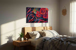 Whirlwind of Crimson Roses floral canvas print, displayed in a bedroom