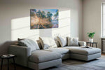 Radiant Dawn in the Pines nature canvas print in a living room scene