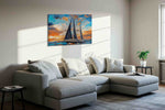 Voyage Through a Painted Dawn sailing canvas print, displayed in a living room