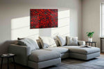 Crimson Symphony floral canvas print in a living room scene