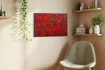 Crimson Symphony floral canvas print, displayed in a living room