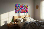 Easter Whirl and Bloom floral canvas print, displayed in a bedroom