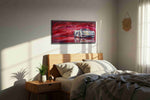 Crimson Velocity automobile canvas print, displayed in a bedroom