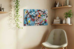 Chaotic Symphony in Blue abstract canvas print styled in a living room