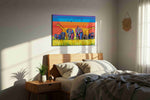 Serengeti Symphony animals canvas print, displayed in a bedroom