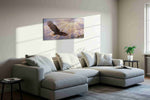 Soaring Through the Radiance birds canvas print, displayed in a living room