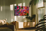Raindrops on Fiery Petals leaves canvas print in a hung canvas mockup
