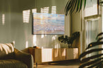 Serenade of Sunrise Waves beach canvas print in a hung canvas mockup