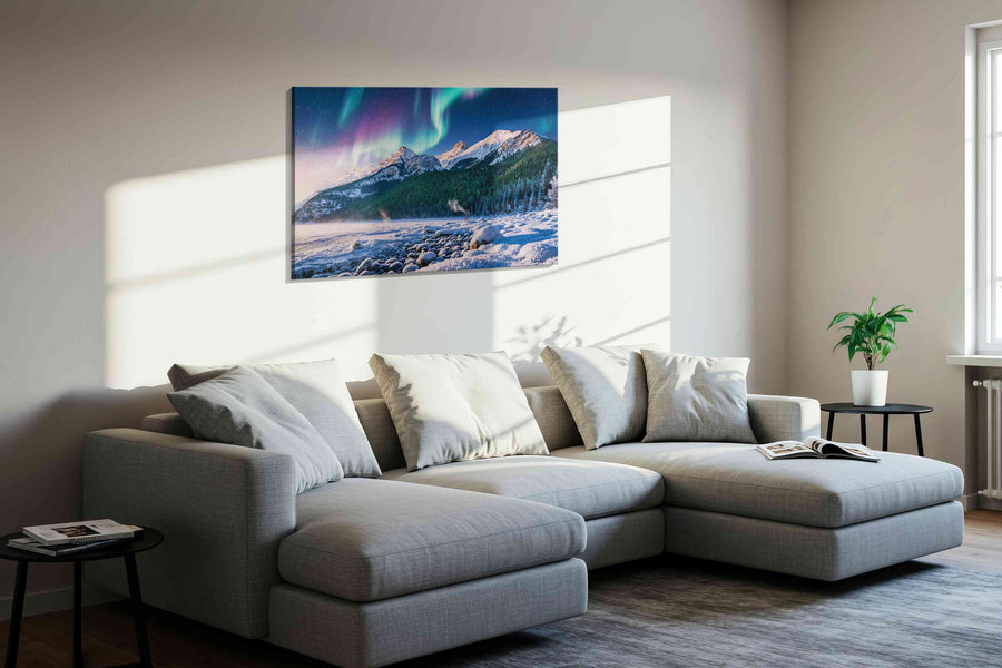 Aurora's Majesty Over Peaks winter canvas print, displayed in a living room
