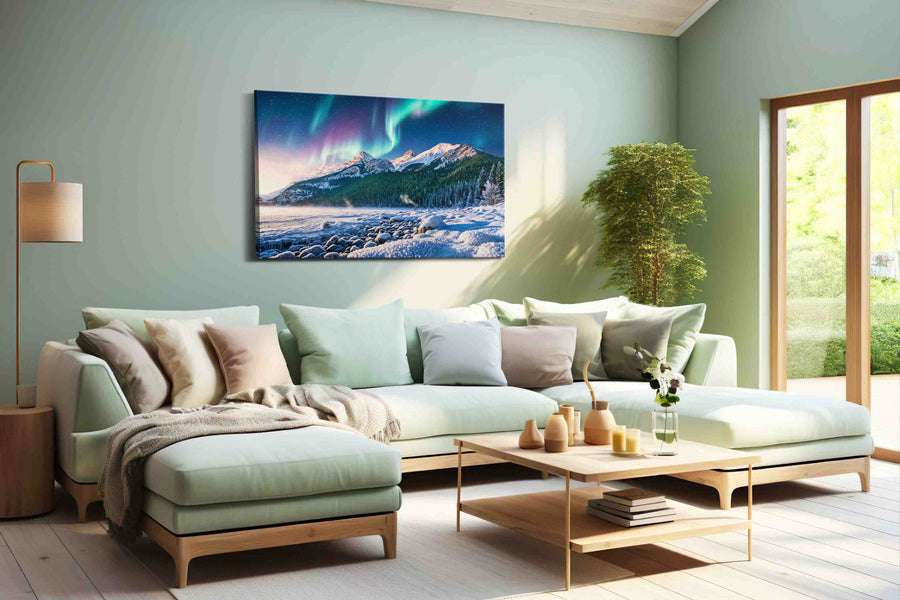 Aurora's Majesty Over Peaks winter canvas print, hanging on wall