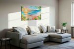 Coral Dawn Reverie beach canvas print in a living room scene
