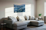 Gilded Whispers of the Tide ocean canvas print, displayed in a living room