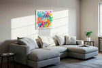 Begin in Brilliant Color motivational canvas print, displayed in a living room