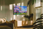 Orchard Beneath Cobalt Skies spring canvas print in a hung canvas mockup