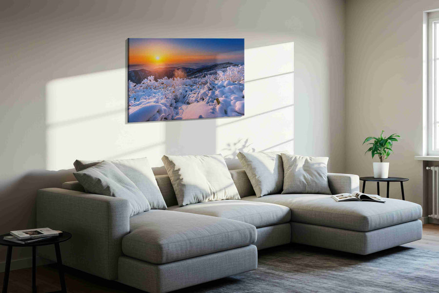 Emberlight on Winter Peaks winter canvas print, displayed in a living room