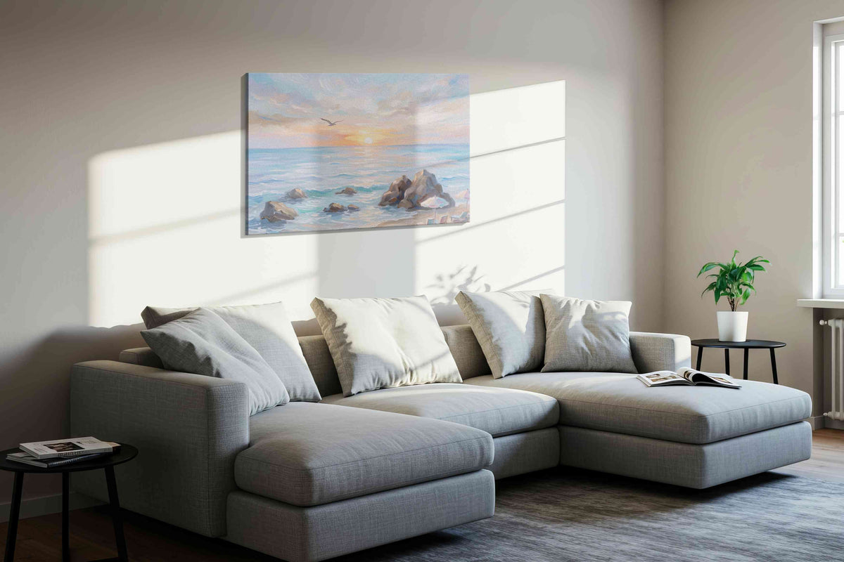 Seabird Over Blush Tide beach canvas wall art displayed above a sofa in a styled living room scene