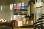 Petalfire Over the Vale canvas wall art shown hanging in a styled interior