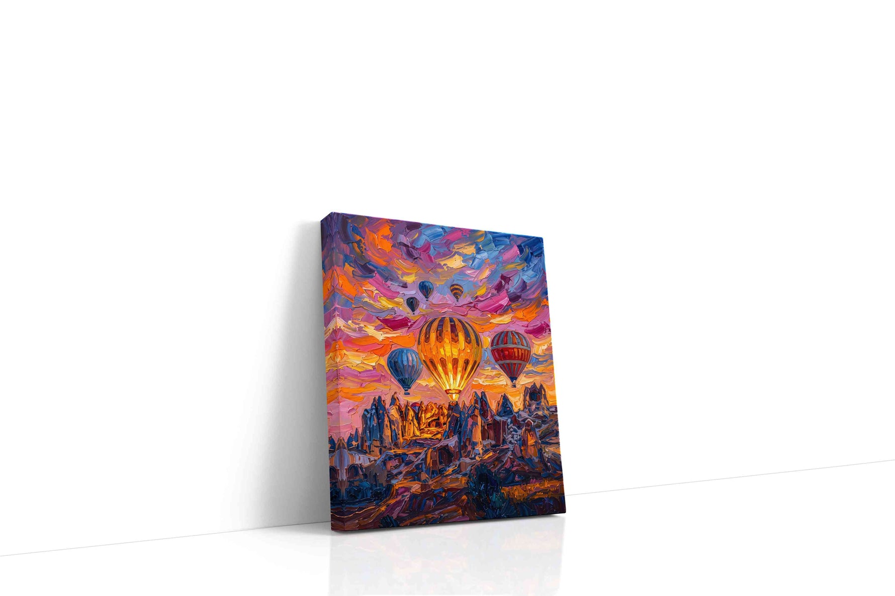 Emberlift Over Painted Peaks landmark canvas wall art displayed above a sofa in a modern living room