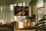 Embers of the Orchestra music canvas wall art displayed above a sofa in a modern living room