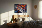 Embers on Ivory Keys music canvas wall art displayed above a bed in a styled bedroom scene