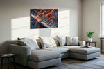 Embers on Ivory Keys music canvas wall art displayed above a sofa in a styled living room scene